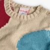 Vestido tricotosa topos de bebé niña.