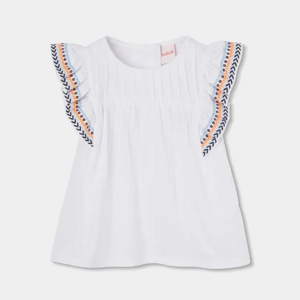 Blusón de tejido fantasía de niña