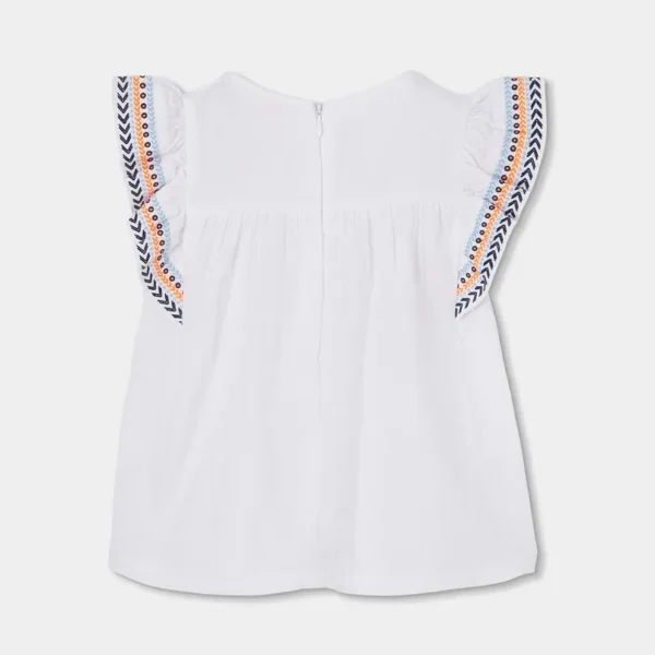 Blusón de tejido fantasía de niña