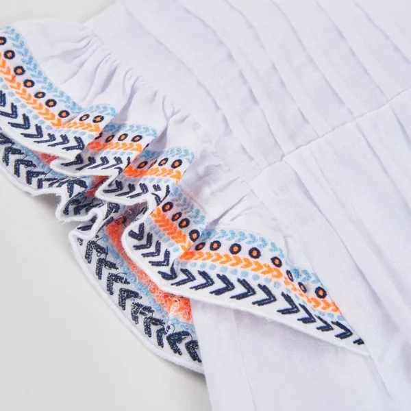 Blusón de tejido fantasía de niña